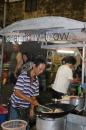 Char kway teow is one of the most popular and famous dishes. Essentially a rice noodle dish with prawns, a few spices, greens,  and maybe a fish broth.  Alway good and less about $1.50